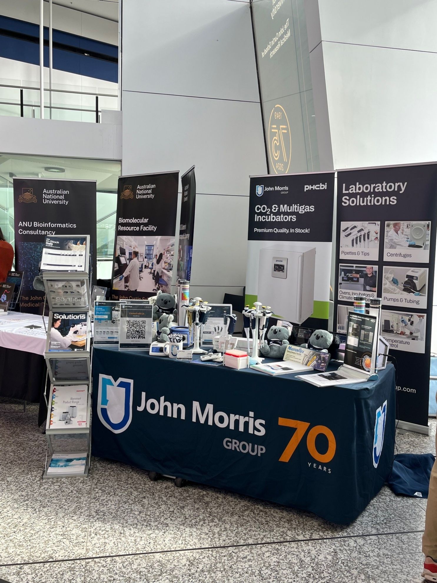 Guy from John Morris Group showcasing lab products